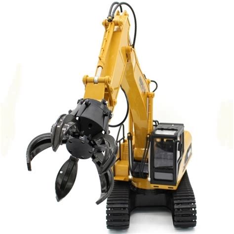 mini excavator with claw|construction vehicle with claw.